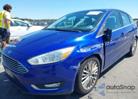2015 Ford Focus Titanium from USA, damaged, VIN 1FADP3N29FL371969